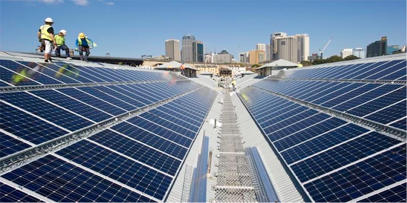 30kW solar system in Adelaide with 3 solar installers standing on roof