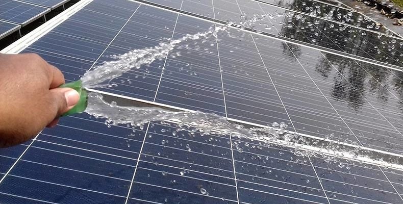 cleaning solar panels with hose